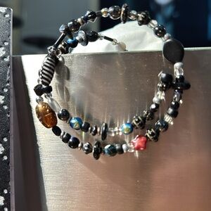 WHBM Multicolored and sized beaded wire bracelet. Always holds its shape and OS.